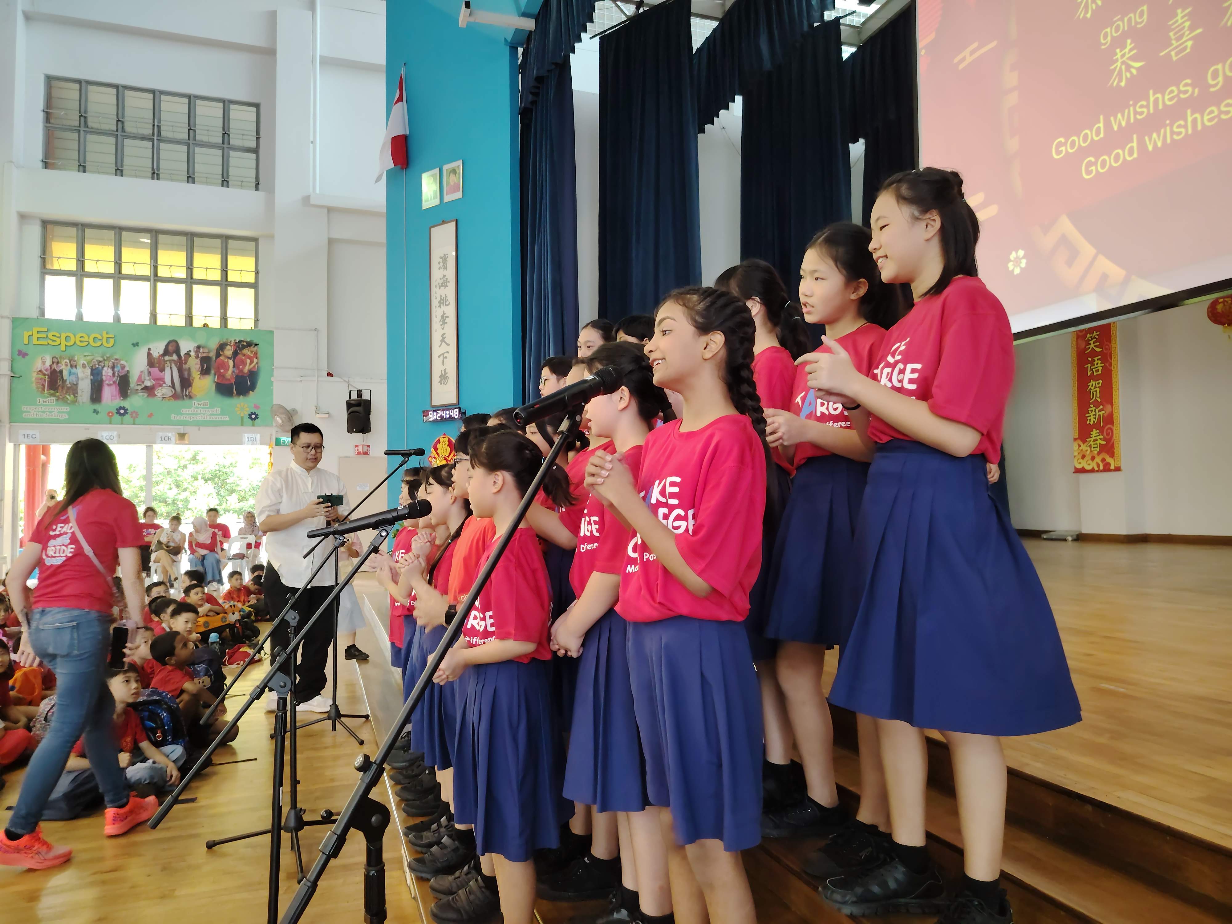 Our choir CCA members performing a lovely song for Chinese New Year Celebration